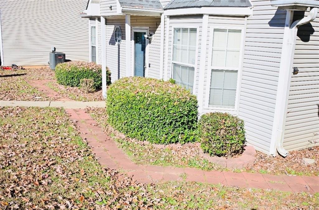 145 Turning Point Stockbridge, GA 30281 - Photo 4 of 21 a front view of a house with garden