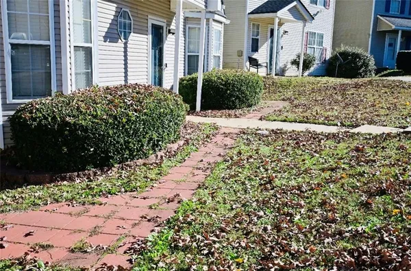 a view of a garden with pathway