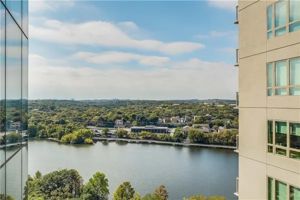 a view of a city and lake