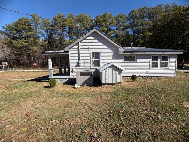 1758 Midway Road Sewanee, TN 37375 - Photo 2 of 15 a view of a house with backyard and trees