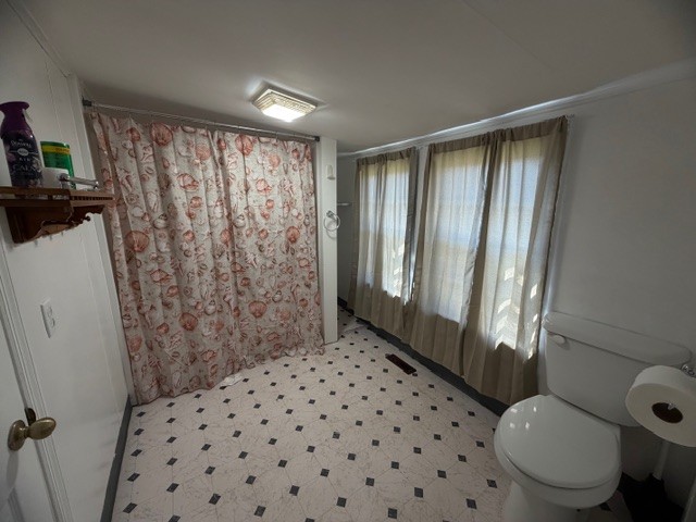 1758 Midway Road Sewanee, TN 37375 - Photo 8 of 15 a bathroom with a sink toilet and shower