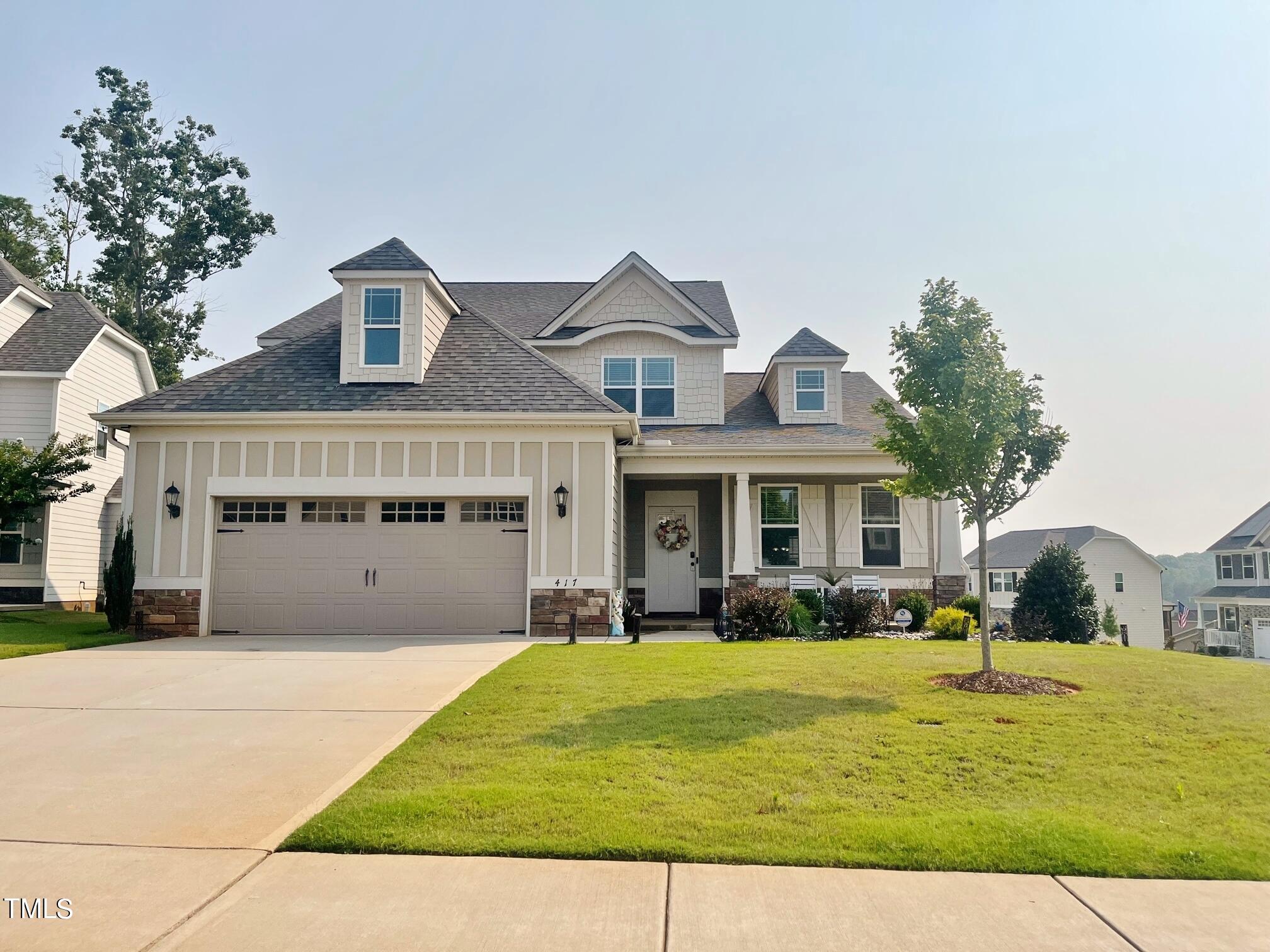 a front view of house with yard