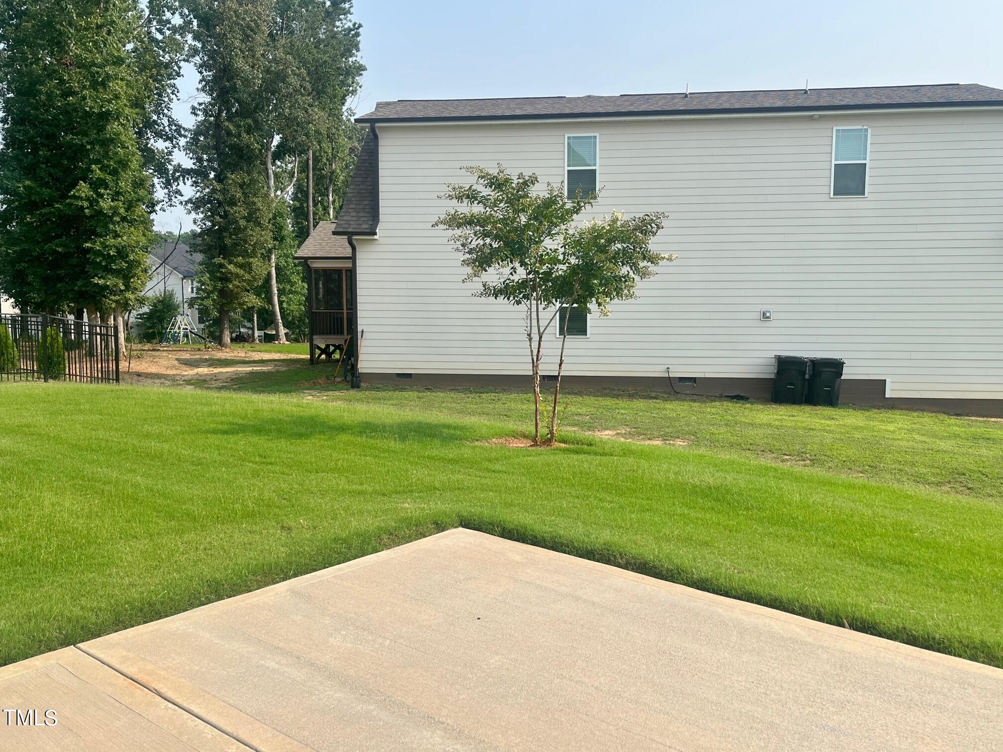 417 Airedale Trail Garner, NC 27529 - Photo 26 of 26 a house with garden in front of it