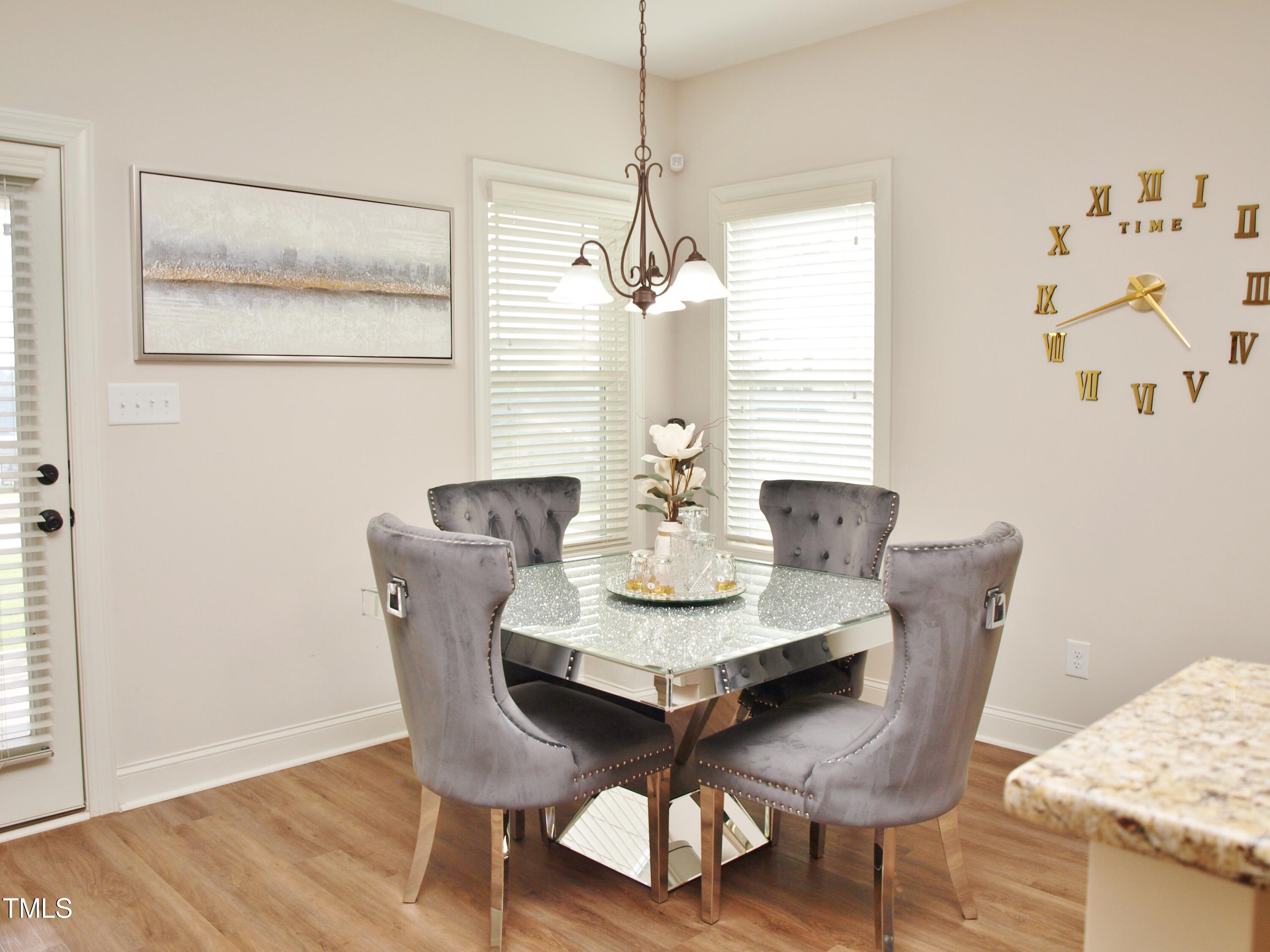417 Airedale Trail Garner, NC 27529 - Photo 9 of 26 a dining room with furniture and window