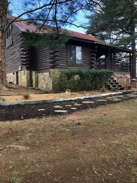 300 Roy Pitt Road Springfield, TN 37172 - Photo 2 of 26 a backyard of a house with lots of green space