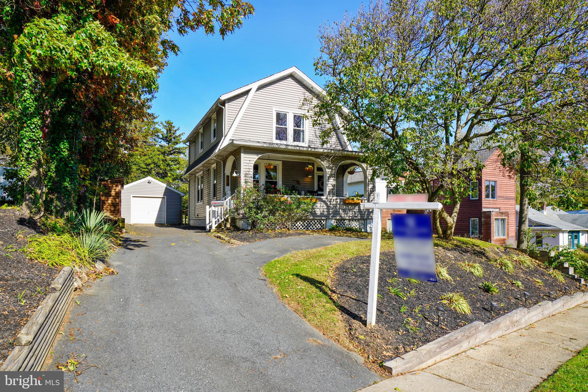 910 Overbrook Road Baltimore, MD 21239 - Photo 1 of 50 a front view of a house with garden
