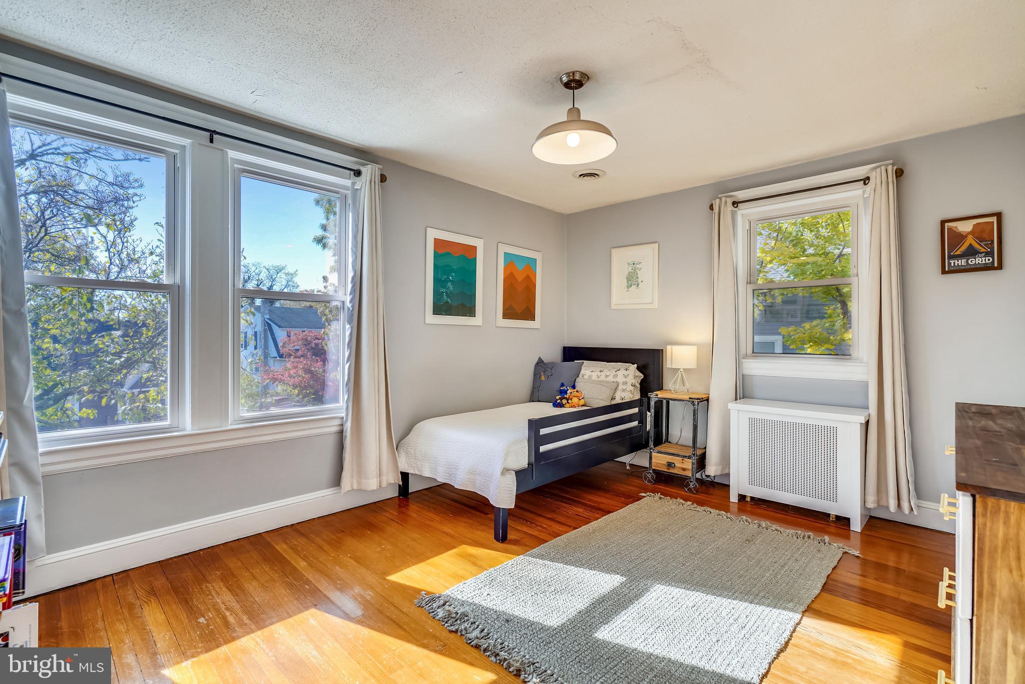 910 Overbrook Road Baltimore, MD 21239 - Photo 24 of 50 a bedroom with furniture and a window