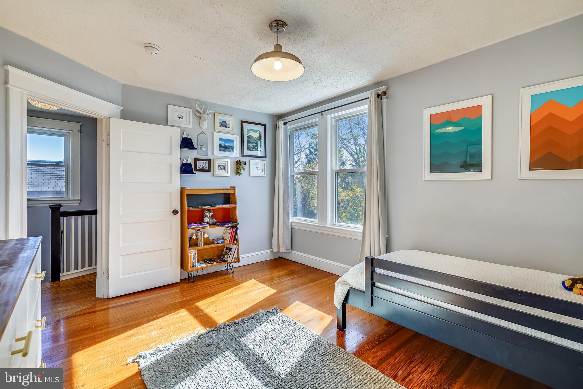 910 Overbrook Road Baltimore, MD 21239 - Photo 25 of 50 a living room with furniture and a window