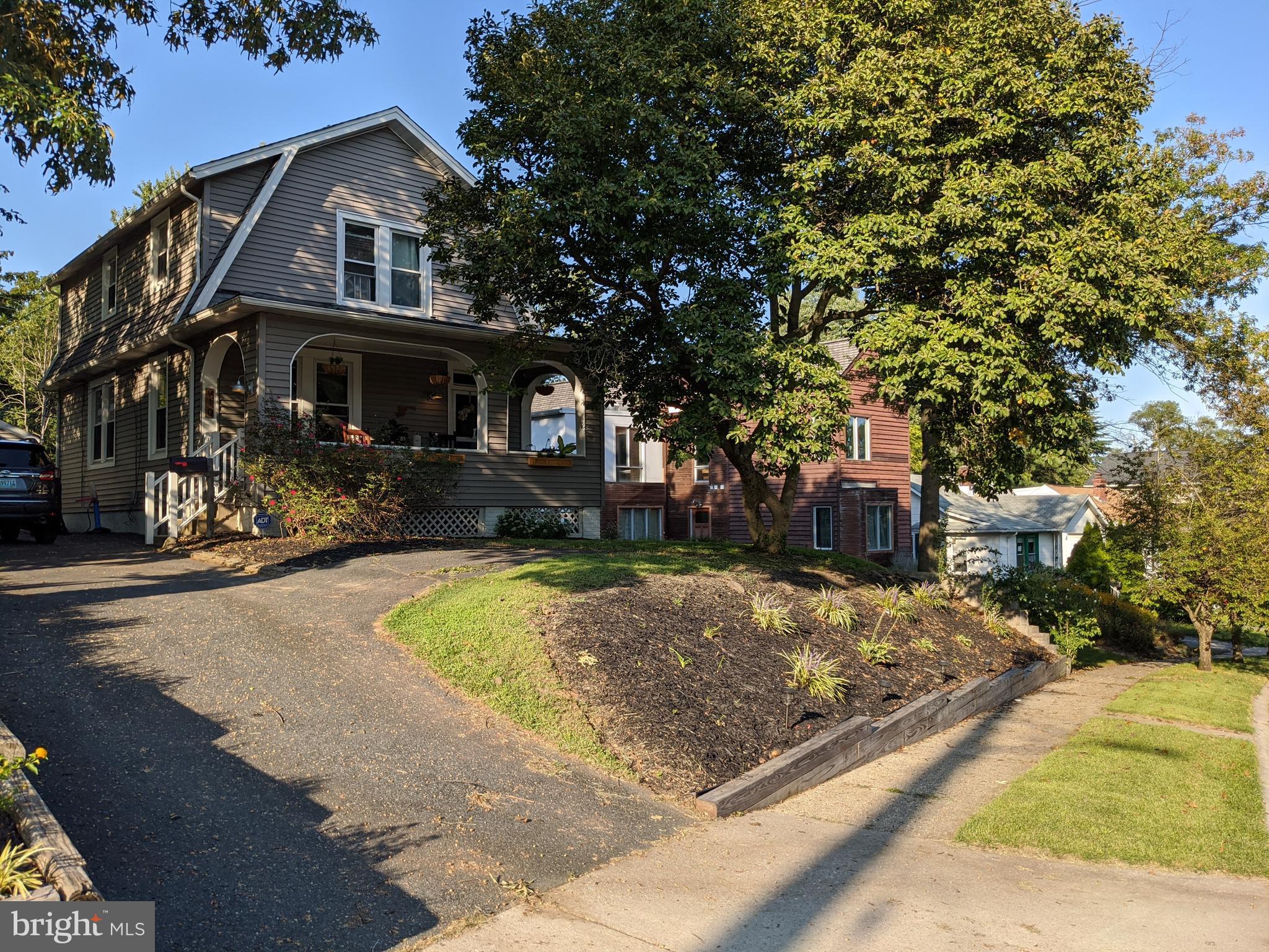 910 Overbrook Road Baltimore, MD 21239 - Photo 40 of 50 a front view of a house with a yard