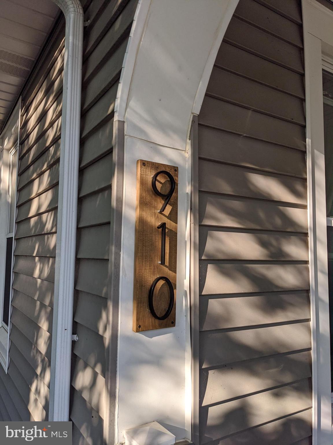 910 Overbrook Road Baltimore, MD 21239 - Photo 41 of 50 a view of entry way with wooden door