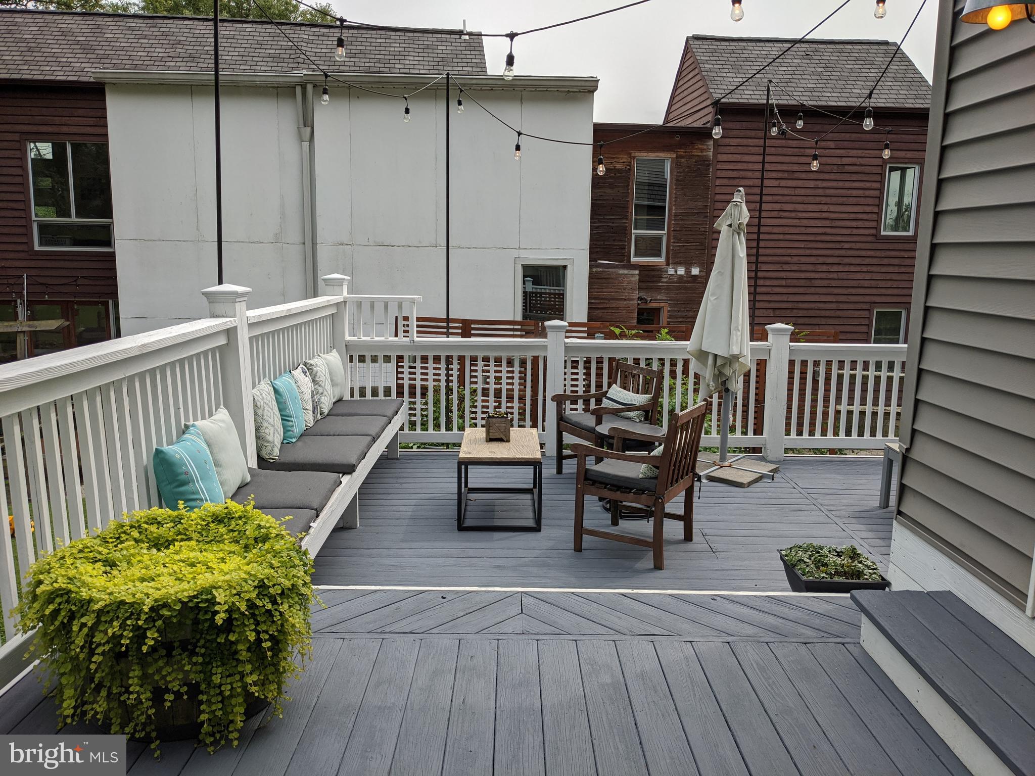 910 Overbrook Road Baltimore, MD 21239 - Photo 46 of 50 a view of two chairs in the balcony