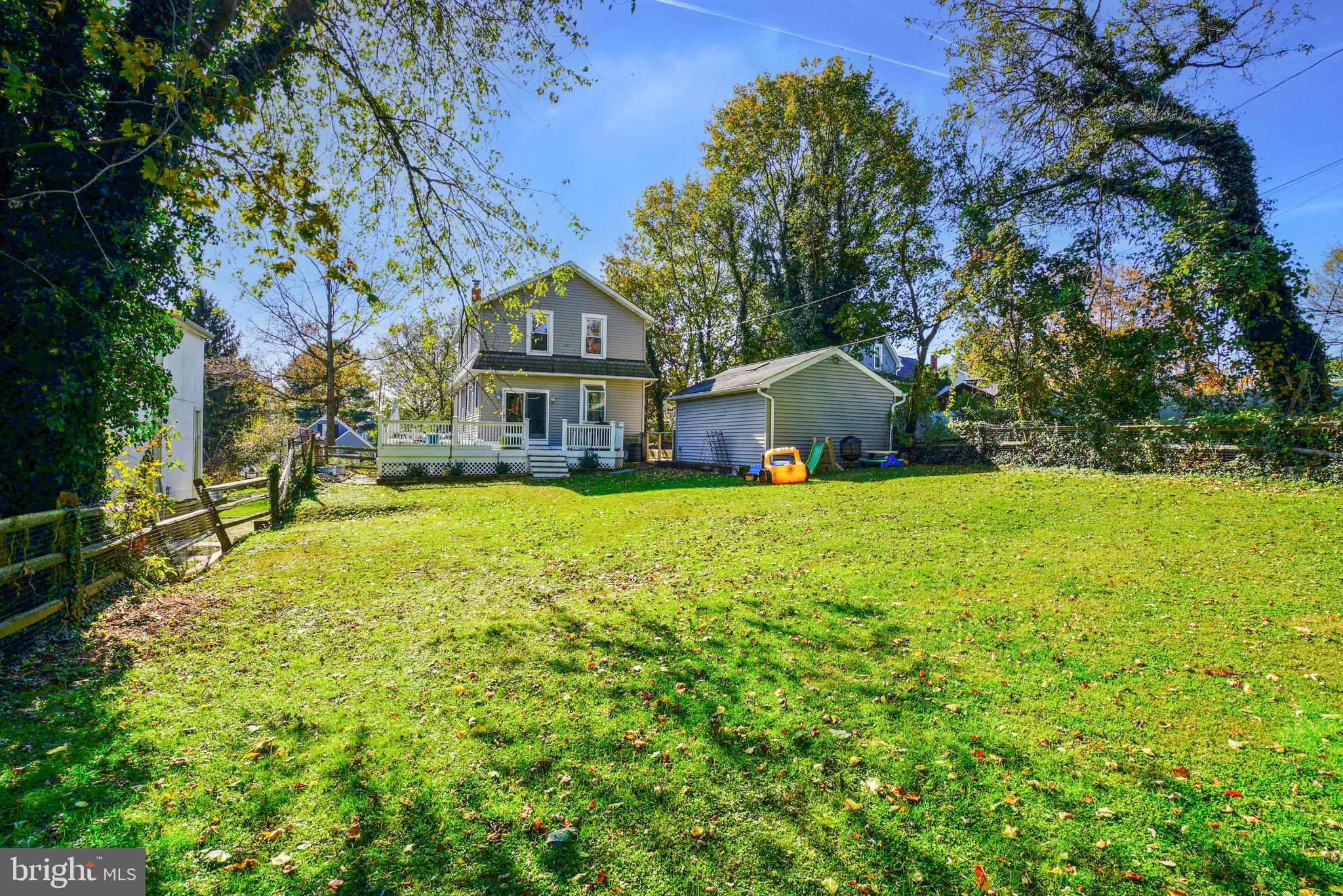 910 Overbrook Road Baltimore, MD 21239 - Photo 50 of 50 a front view of a house with yard and green space