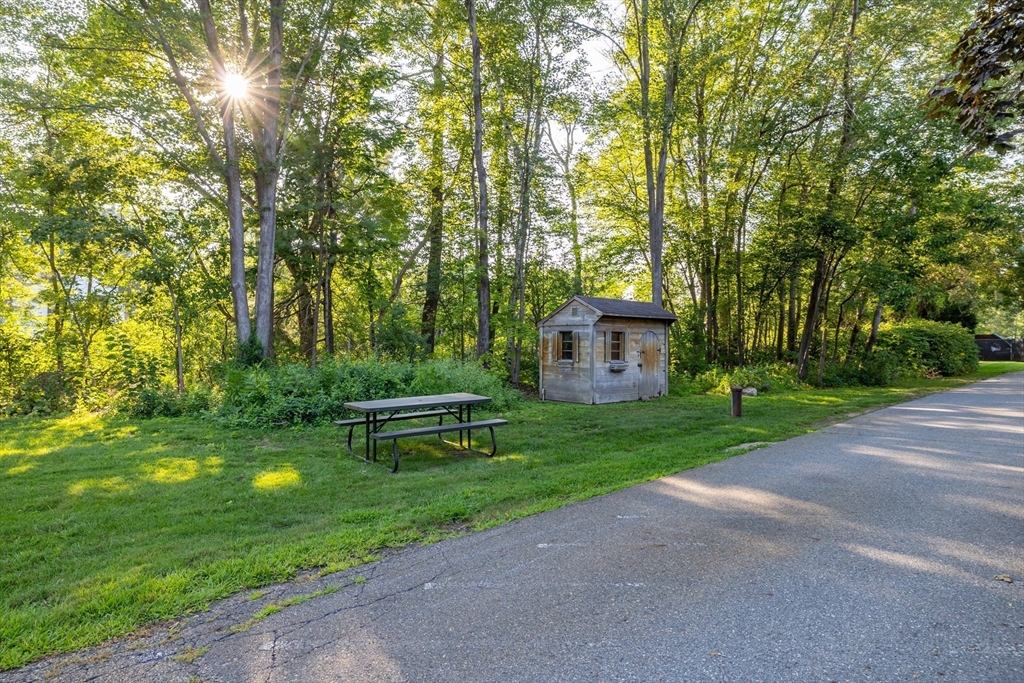 189 Littleton Road, Unit 10 Chelmsford, MA 01824 - Photo 11 of 15 a view of a house with a backyard