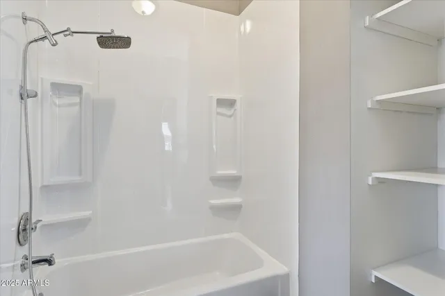 a bathroom with a bathtub