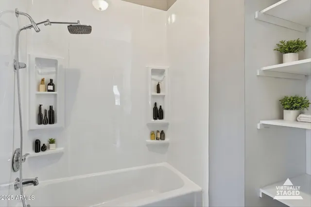 a bathroom with a bathtub