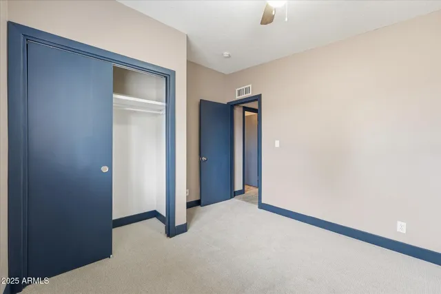 a view of a room with a hallway