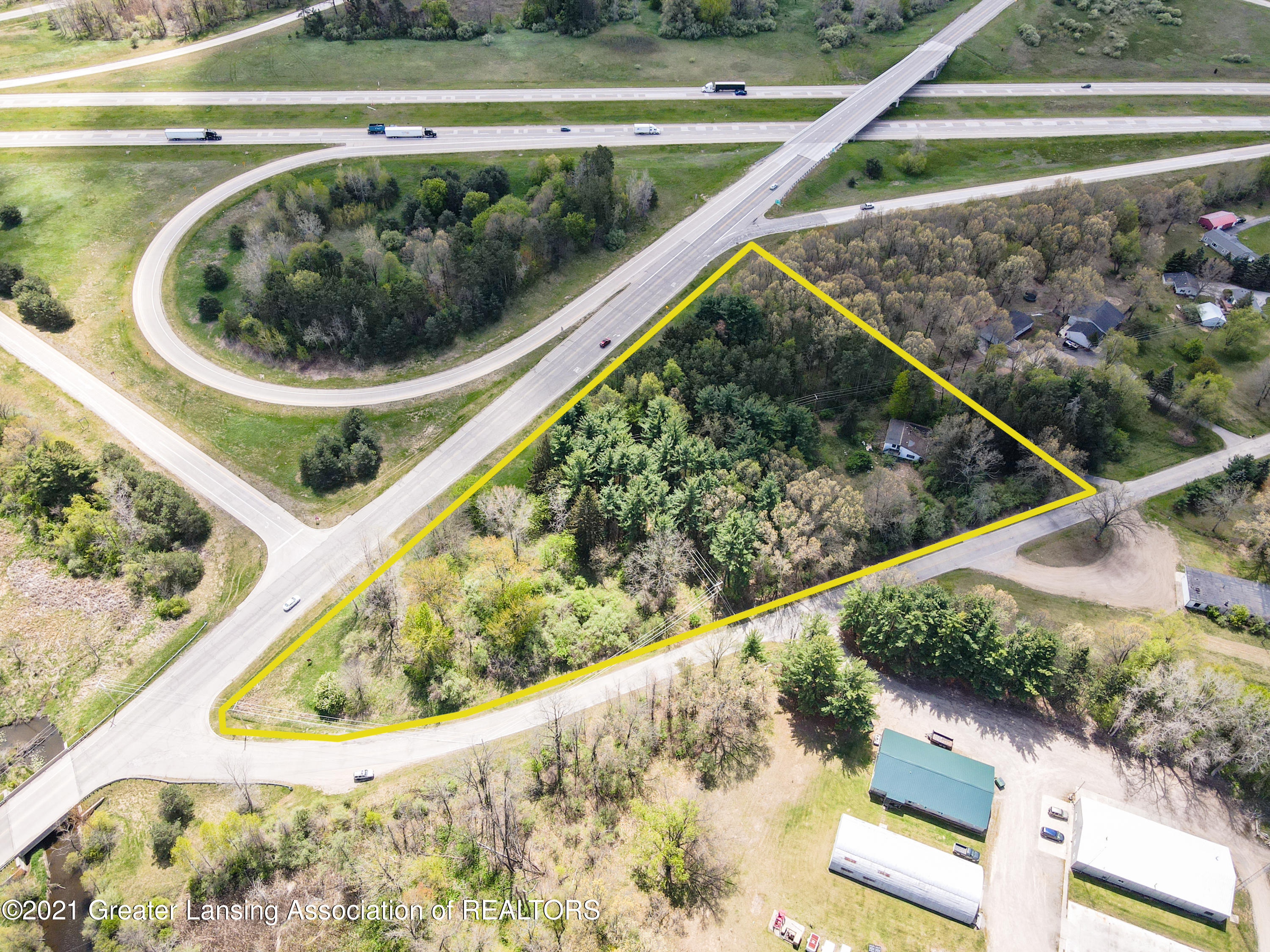 9911 Stoll Road East Lansing, MI 48823 - Photo 1 of 12 9911_Stoll_Rd_Spring-1
