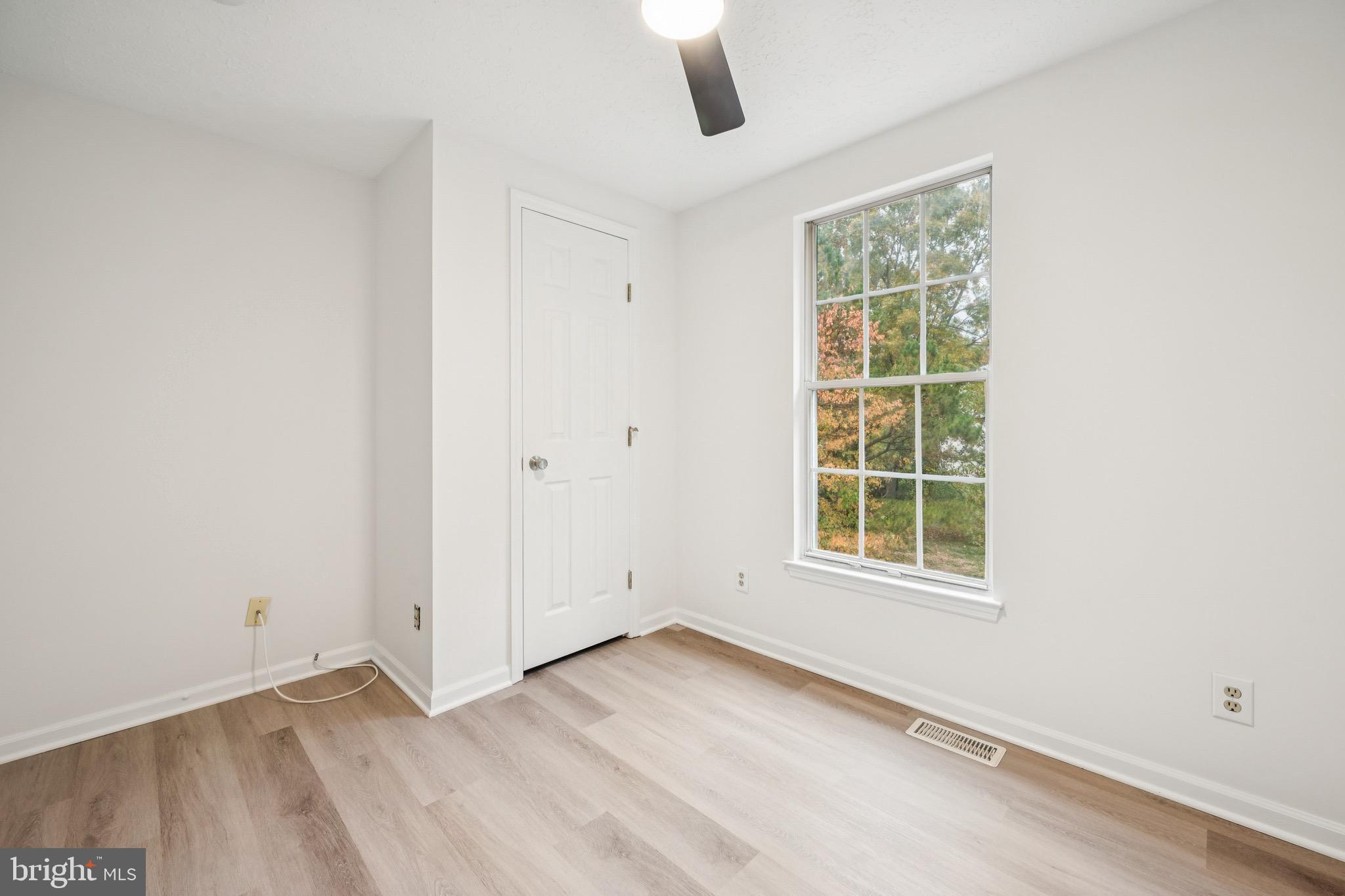 29 Wagon Wheel Drive Sicklerville, NJ 08081 - Photo 11 of 18 an empty room with windows