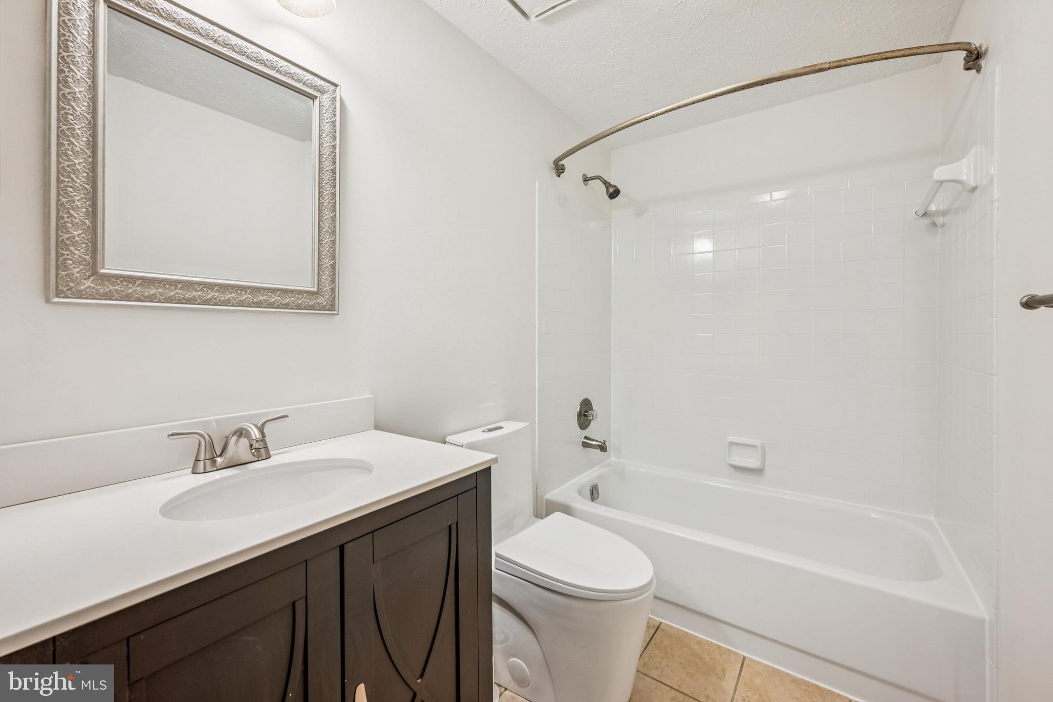 29 Wagon Wheel Drive Sicklerville, NJ 08081 - Photo 12 of 18 a bathroom with a sink a toilet and shower