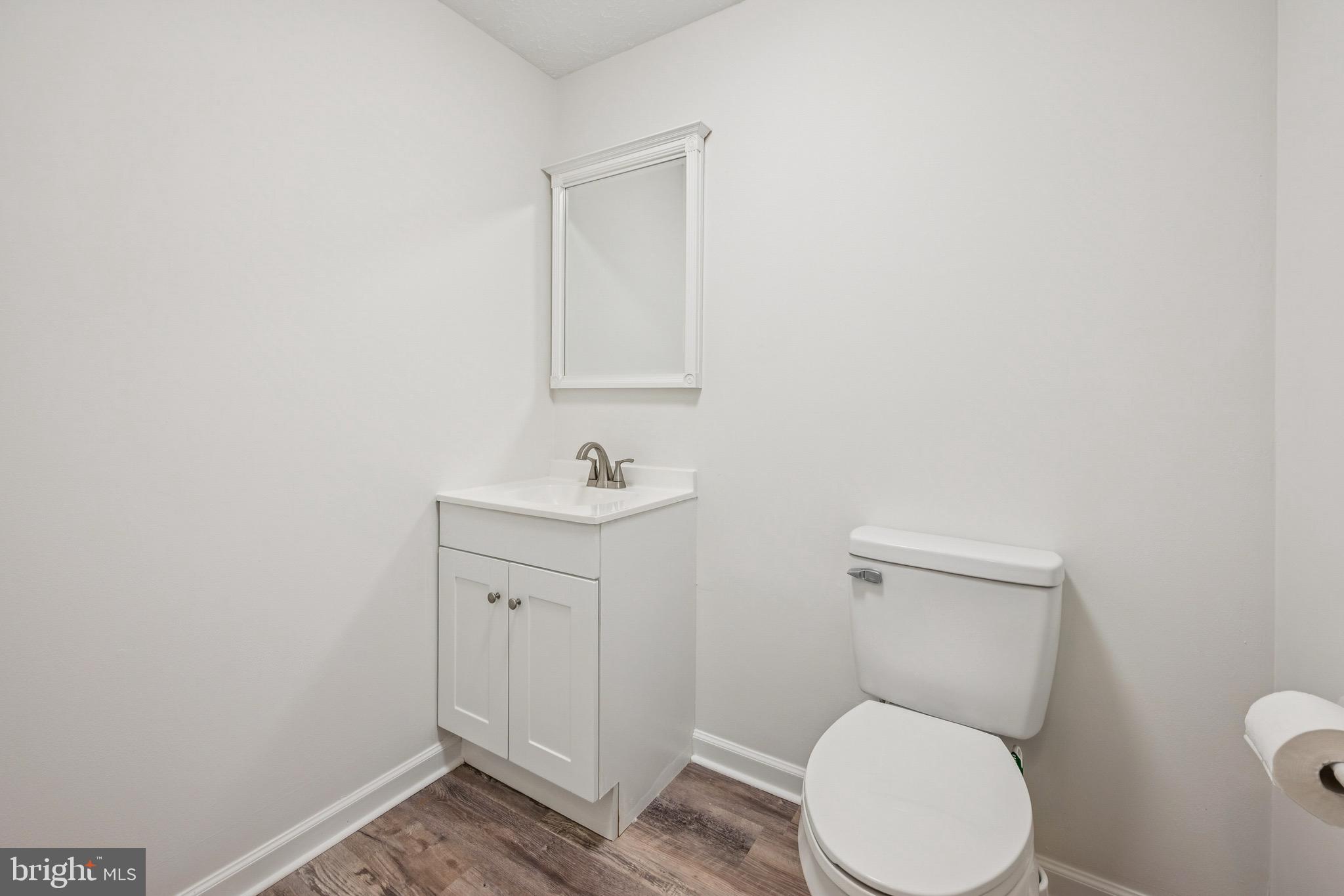 29 Wagon Wheel Drive Sicklerville, NJ 08081 - Photo 14 of 18 a bathroom with a toilet a sink and mirror
