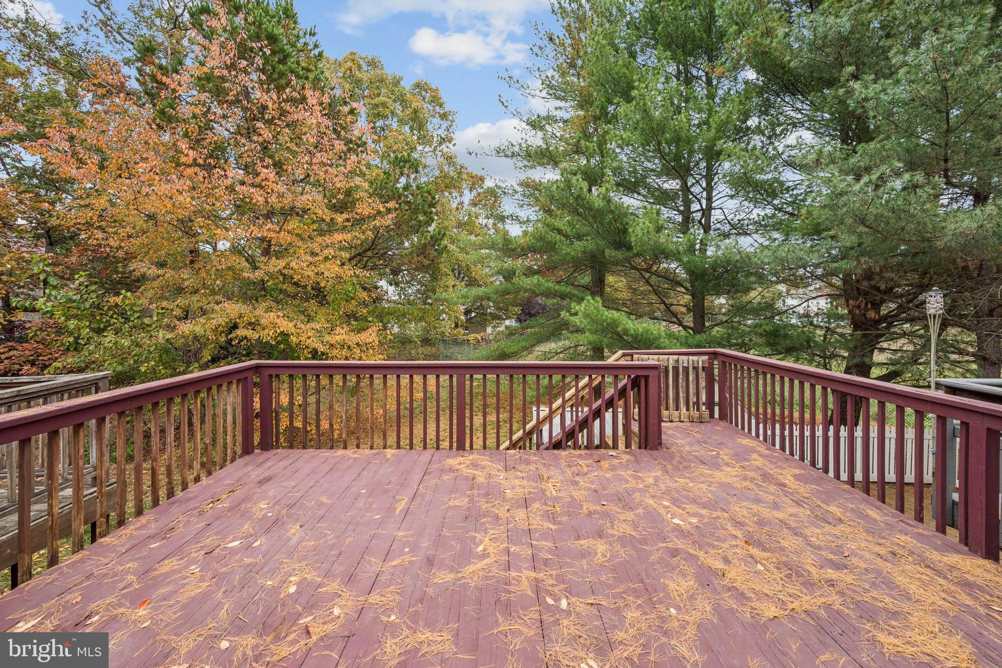 29 Wagon Wheel Drive Sicklerville, NJ 08081 - Photo 16 of 18 a view of balcony with wooden floor and fence
