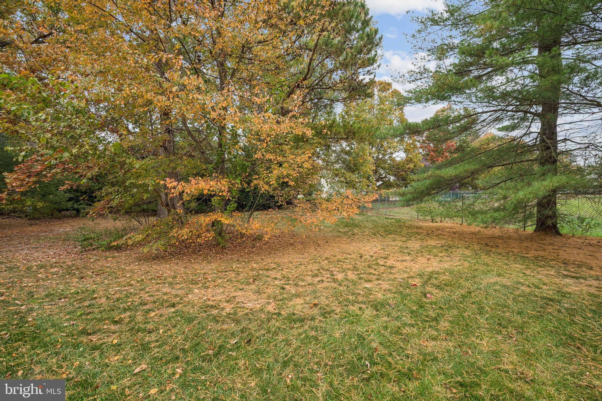29 Wagon Wheel Drive Sicklerville, NJ 08081 - Photo 17 of 18 a view of a field of grass and trees