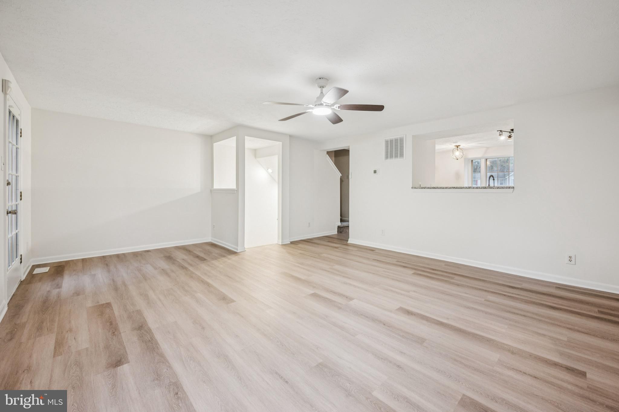 29 Wagon Wheel Drive Sicklerville, NJ 08081 - Photo 7 of 18 wooden floor in an empty room