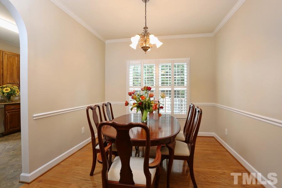 5900 Canewood Place Raleigh, NC 27612 - Photo 7 of 20 Updated paint and hardwood floors.