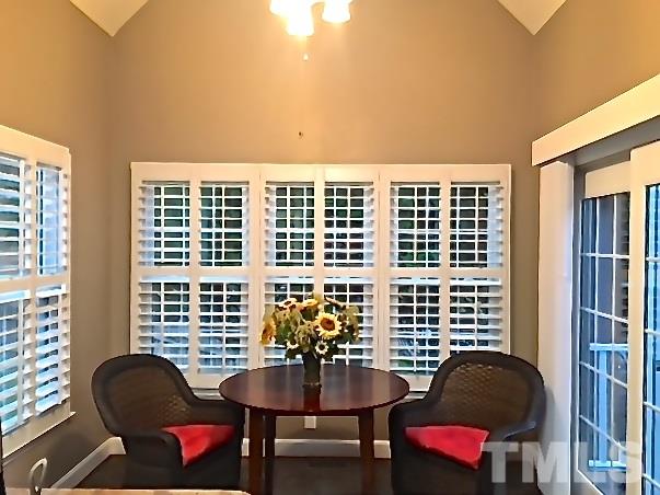 5900 Canewood Place Raleigh, NC 27612 - Photo 10 of 20 The vaulted ceiling in this breakfast room gives it even a larger feel. You can easily fit a larger table and more chairs if desired. Notice the planation shutters, newer windows and sliding doors!