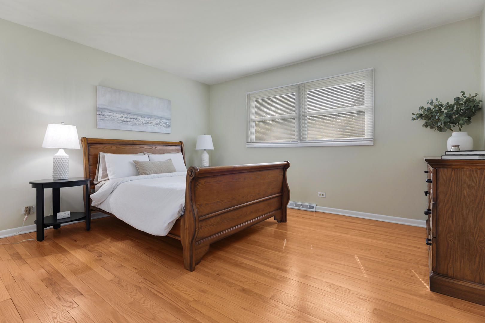 1827 West Sherry Lane Addison, IL 60101 - Photo 14 of 31 a bedroom with a bed lamp and a window