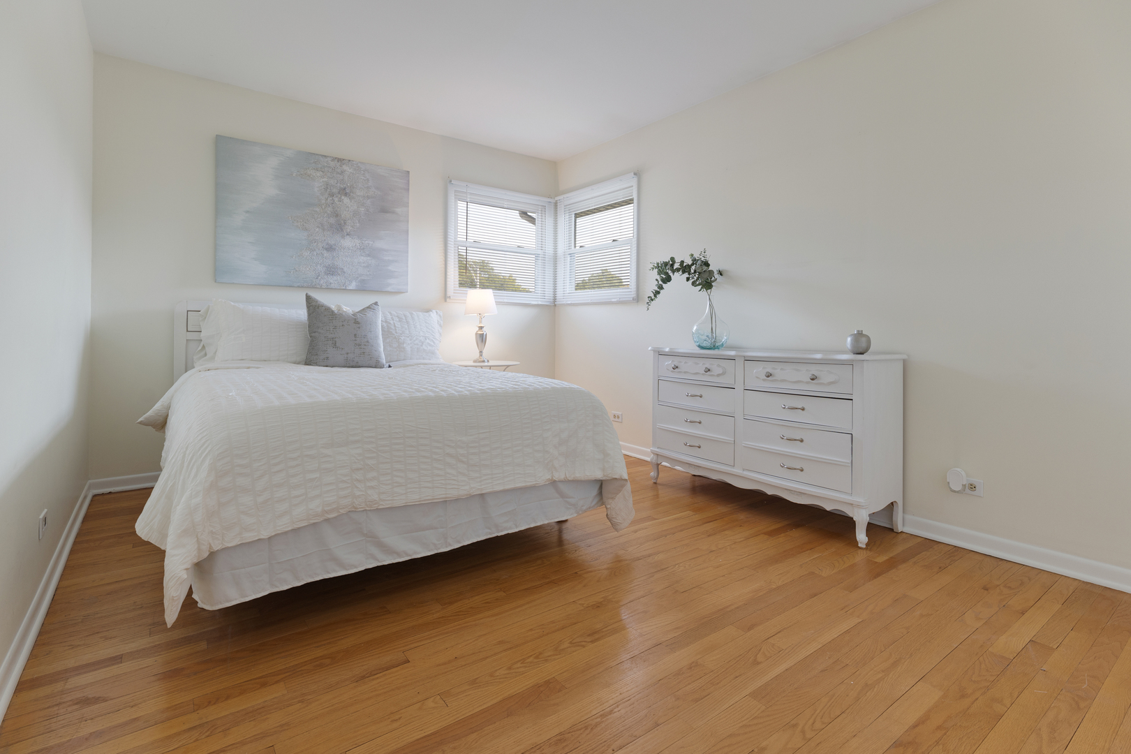 1827 West Sherry Lane Addison, IL 60101 - Photo 17 of 31 a bedroom with a bed and a dresser