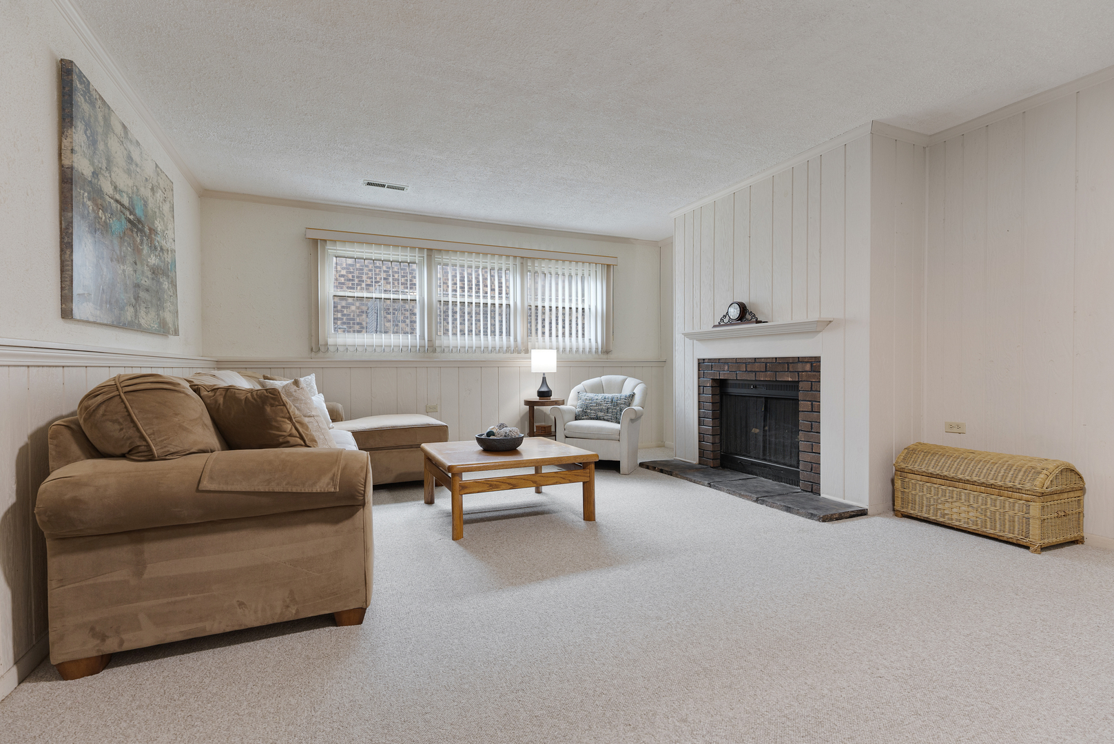 1827 West Sherry Lane Addison, IL 60101 - Photo 20 of 31 a living room with furniture and a fireplace