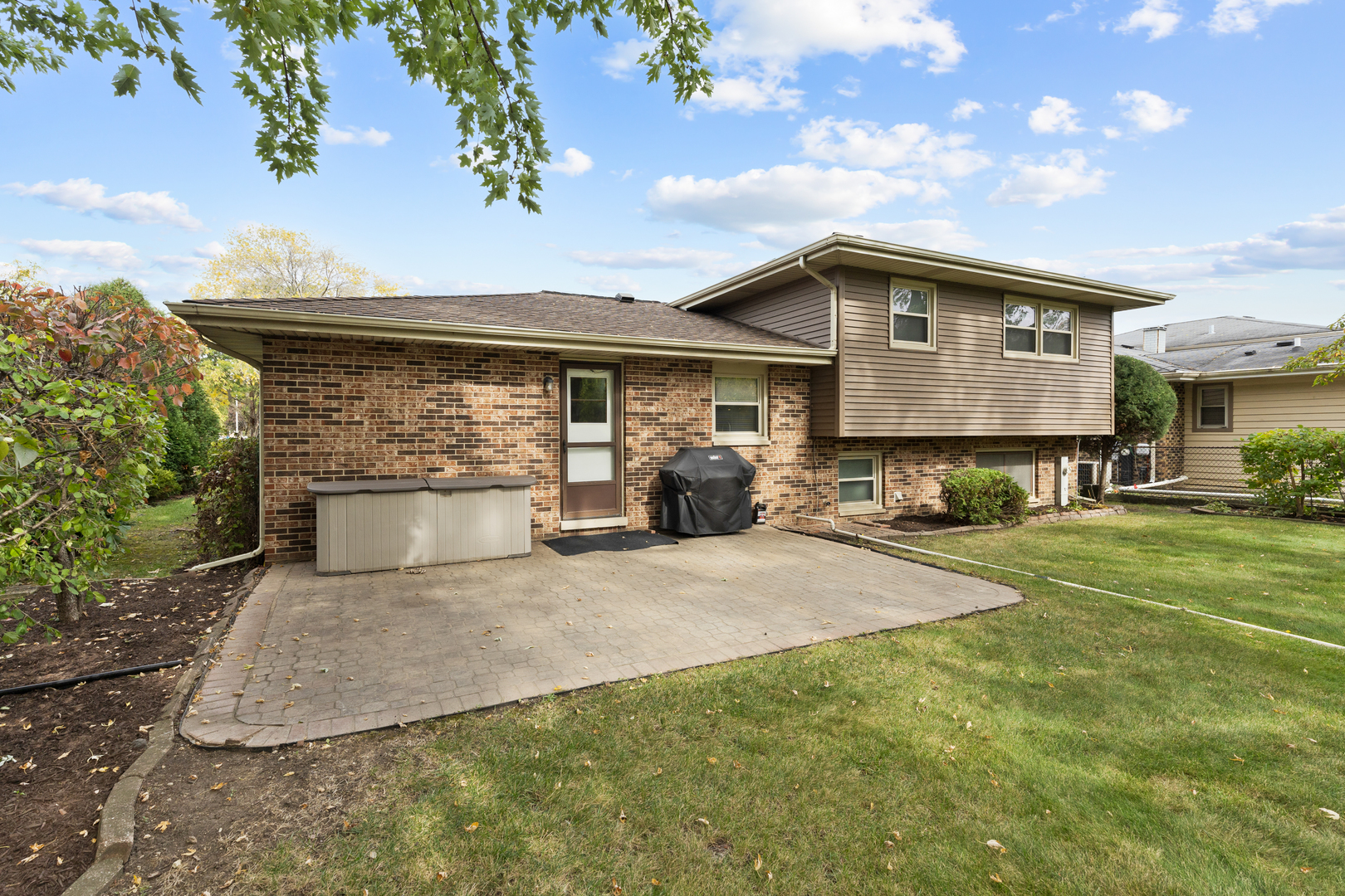 1827 West Sherry Lane Addison, IL 60101 - Photo 25 of 31 a front view of a house with garden