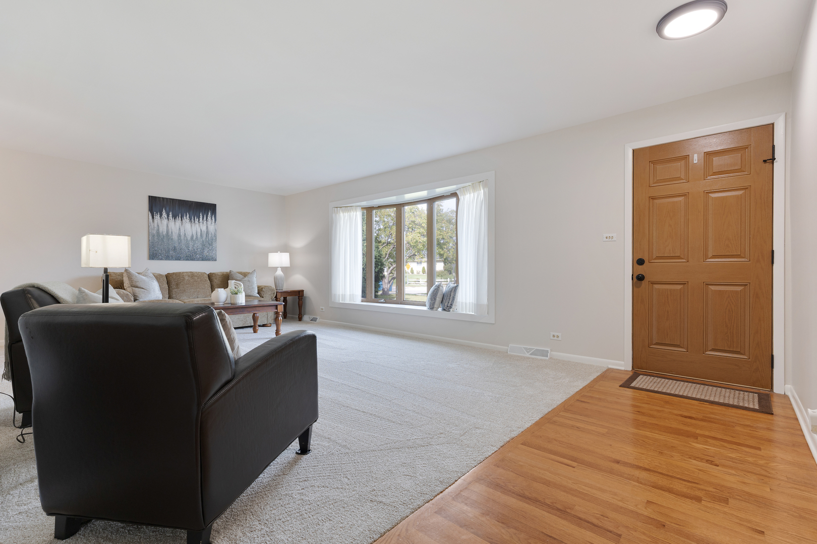 1827 West Sherry Lane Addison, IL 60101 - Photo 3 of 31 a living room with furniture and a window