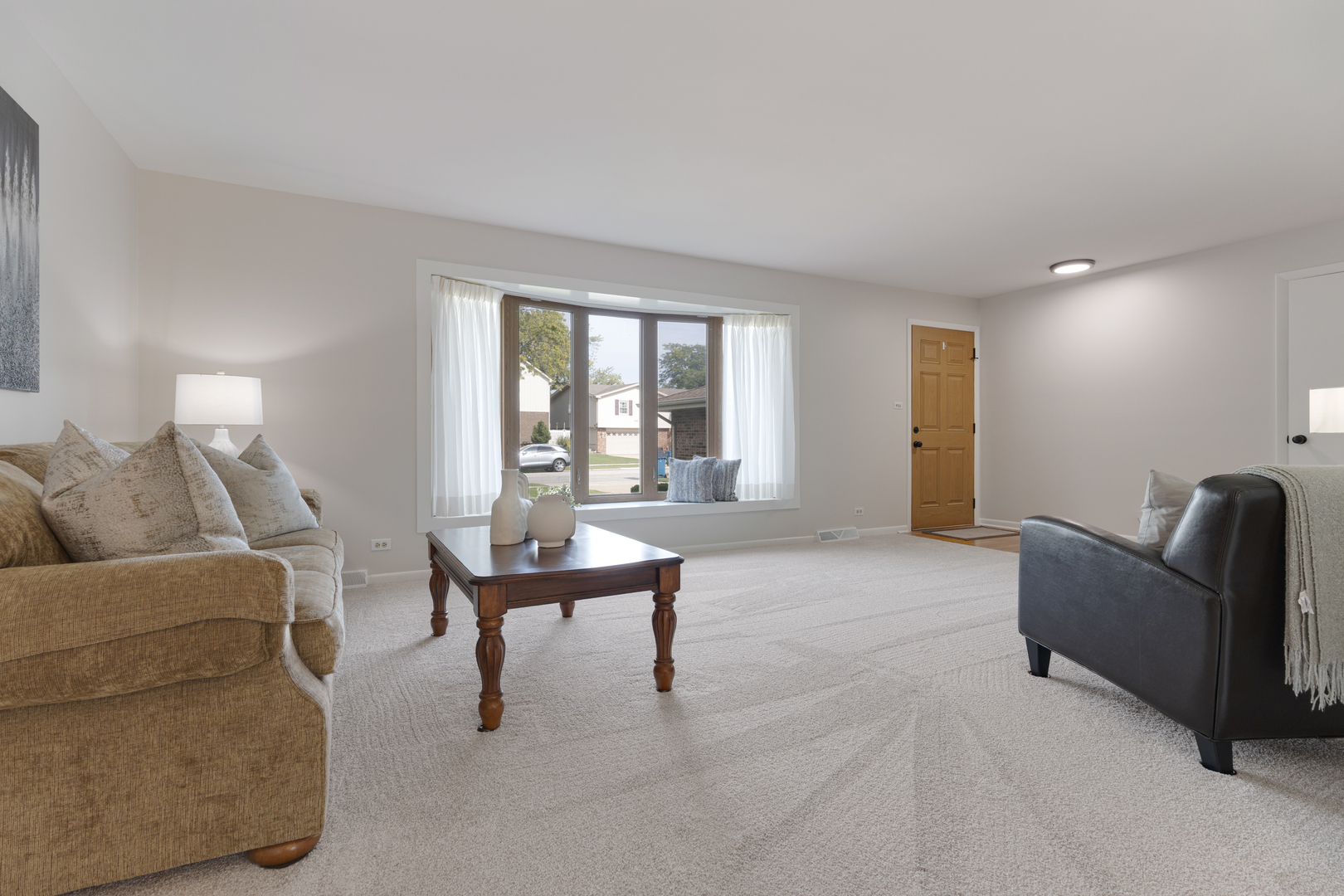 1827 West Sherry Lane Addison, IL 60101 - Photo 5 of 31 a living room with furniture and a large window