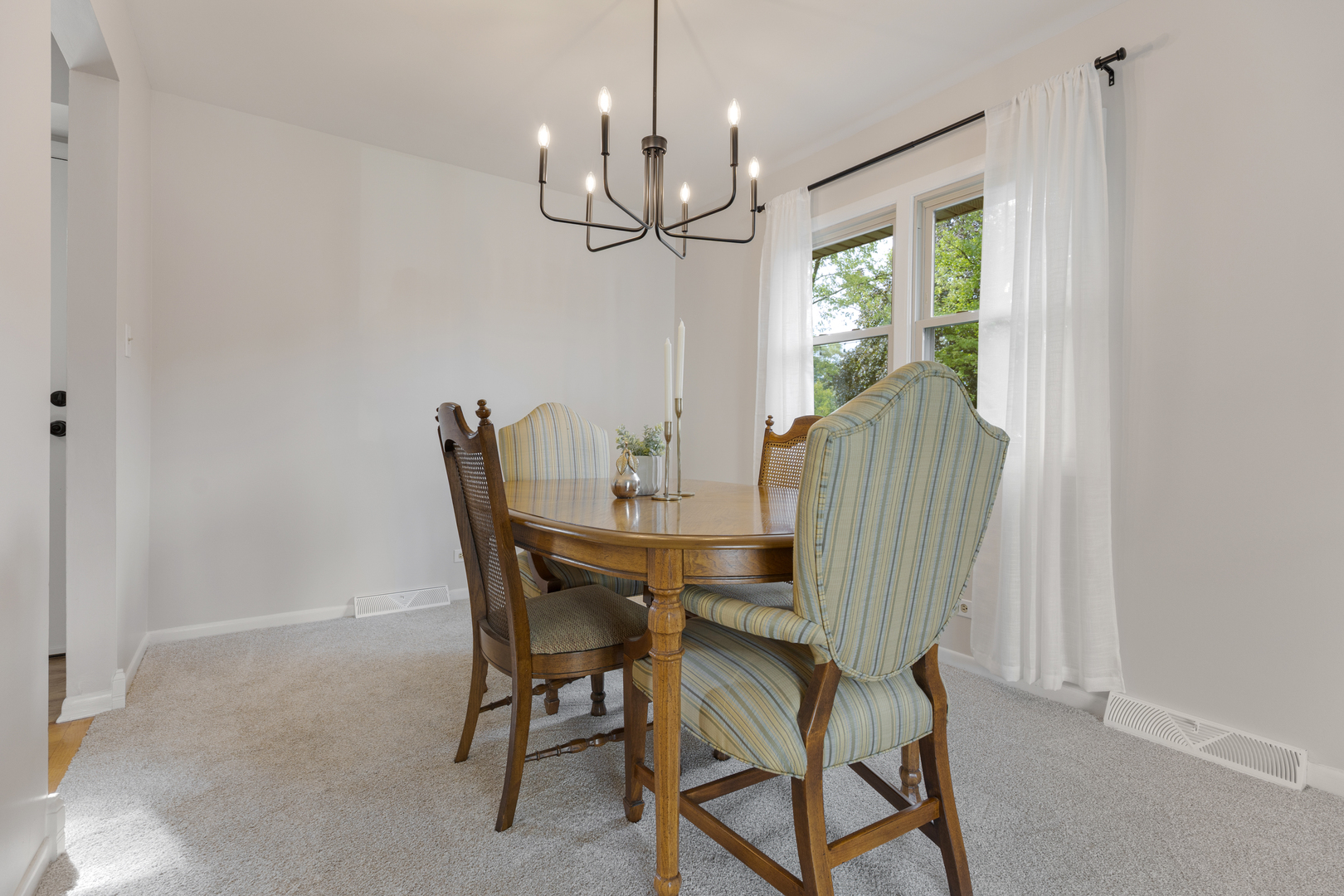 1827 West Sherry Lane Addison, IL 60101 - Photo 6 of 31 a view of a dining room with furniture window and outside view