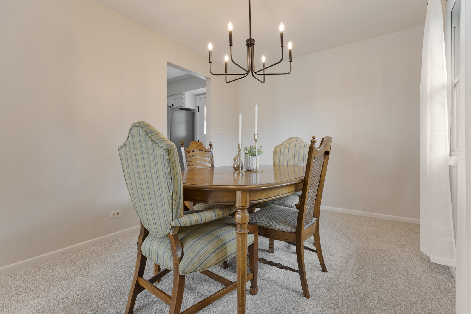 1827 West Sherry Lane Addison, IL 60101 - Photo 7 of 31 a view of a dining room with furniture and chandelier