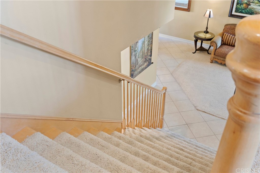 28043 Nantucket Street Castaic, CA 91384 - Photo 21 of 61 a view of a room with wooden floor and furniture