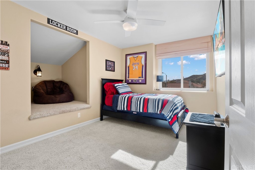 28043 Nantucket Street Castaic, CA 91384 - Photo 28 of 61 a bedroom with a bed and window