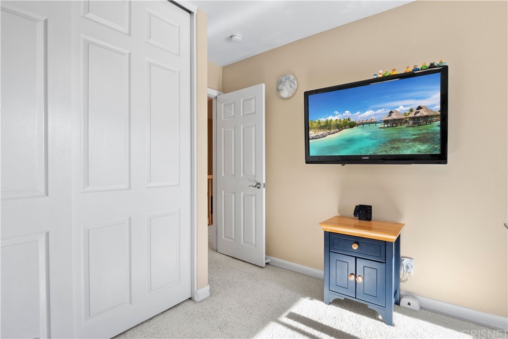 28043 Nantucket Street Castaic, CA 91384 - Photo 34 of 61 a living room with furniture and a flat screen tv