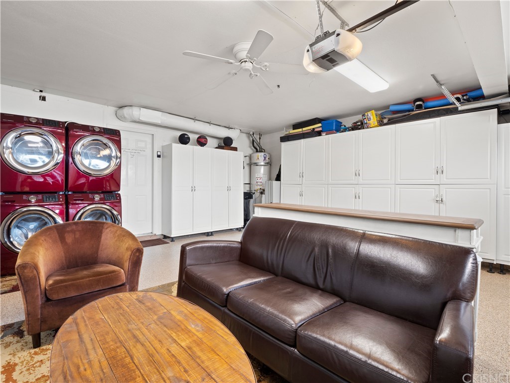 28043 Nantucket Street Castaic, CA 91384 - Photo 36 of 61 a living room with furniture and a ceiling fan