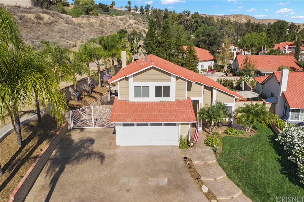 28043 Nantucket Street Castaic, CA 91384 - Photo 56 of 61 a view of a house with a yard