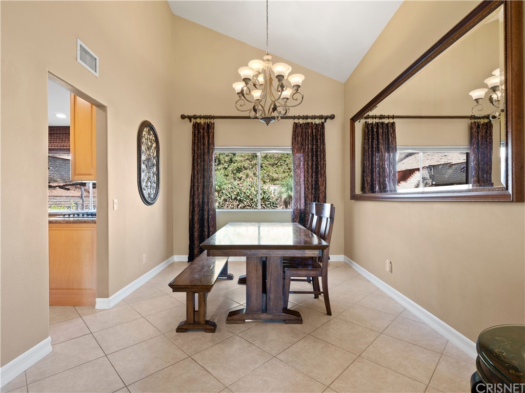 28043 Nantucket Street Castaic, CA 91384 - Photo 9 of 61 a dining room with furniture and window