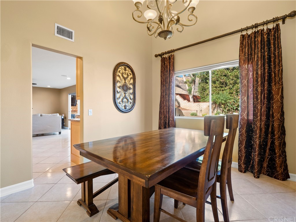 28043 Nantucket Street Castaic, CA 91384 - Photo 10 of 61 a view of a dining room with furniture window and outside view