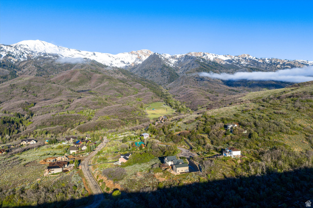 6975 North Durfee Way, Unit 20 Eden, UT 84310 - Photo 14 of 15 Expansive mountain landscape featuring distant snow-capped peaks and scattered residential properties