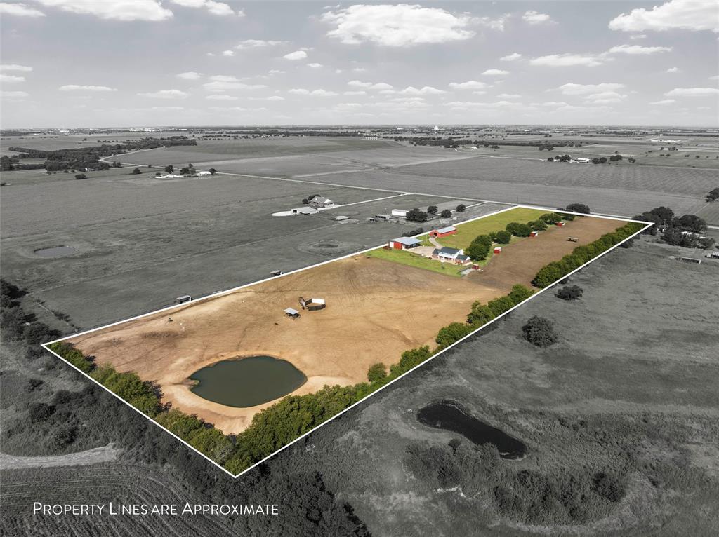5112 Old Caufield Ranch Road McGregor, TX 76657 - Photo 1 of 39 a view of a lake with a mountain