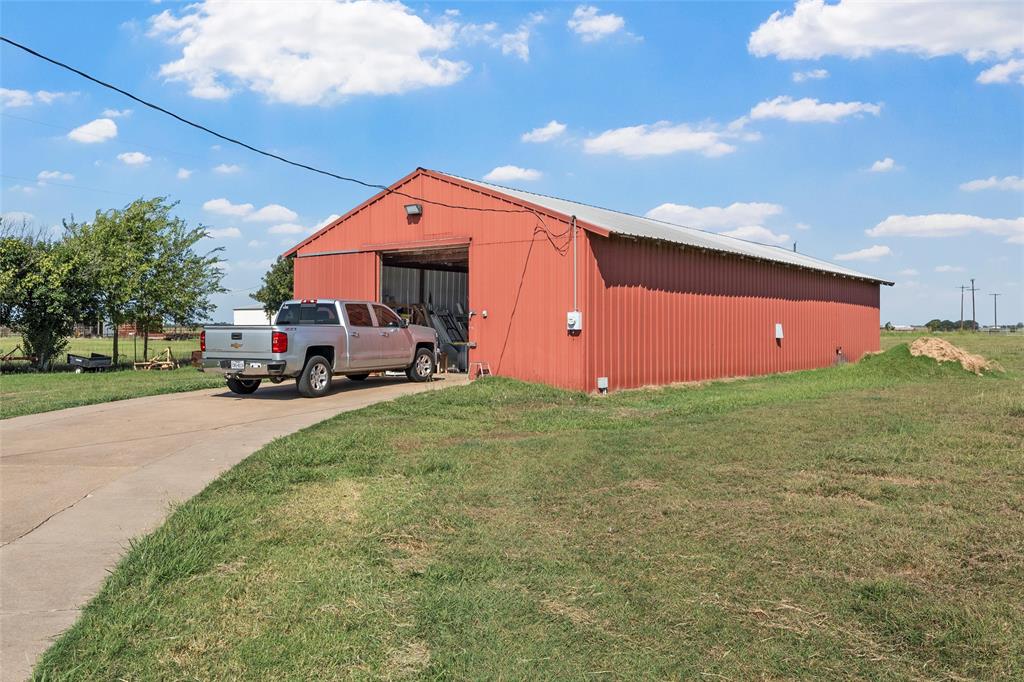 5112 Old Caufield Ranch Road McGregor, TX 76657 - Photo 11 of 39 a front view of a house with a yard