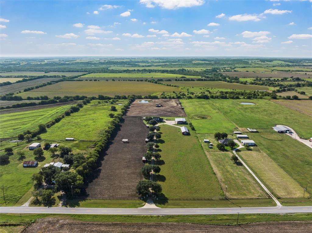 5112 Old Caufield Ranch Road McGregor, TX 76657 - Photo 35 of 39 a view of a lake with a yard