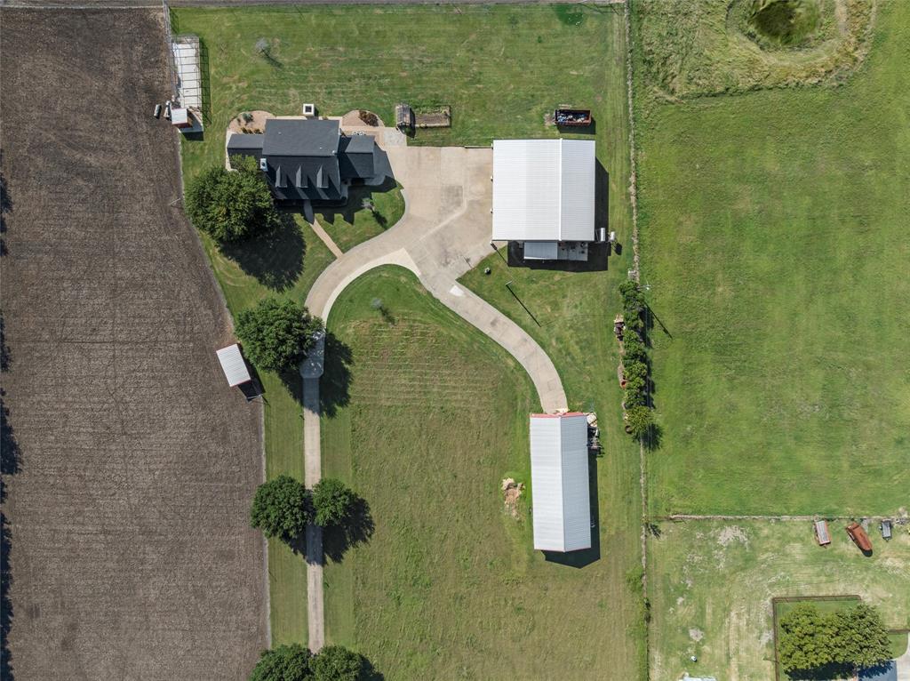 5112 Old Caufield Ranch Road McGregor, TX 76657 - Photo 38 of 39 an aerial view of a house with outdoor space swimming pool
