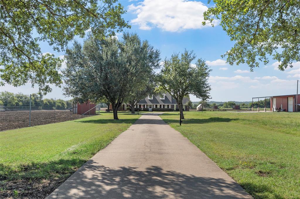 5112 Old Caufield Ranch Road McGregor, TX 76657 - Photo 10 of 39 a view of a park with large trees